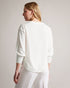 RAILI-Knitwear-Luxury and loungewear collide in the RAILI jumper. Featuring a relaxed fit in a breathable cotton and linen blend, the true standout of this piece is the floral satin front. Perfect for a day out with friends or a casual date, it offers both comfort and style. Jumper Botanical bouquet print Satin front Cotton and linen blend V-neck 3/4 length sleeves Round hem Jara is 5'10.5" / 1.79cm and wears White in a Ted size 1- Ted Baker Romania